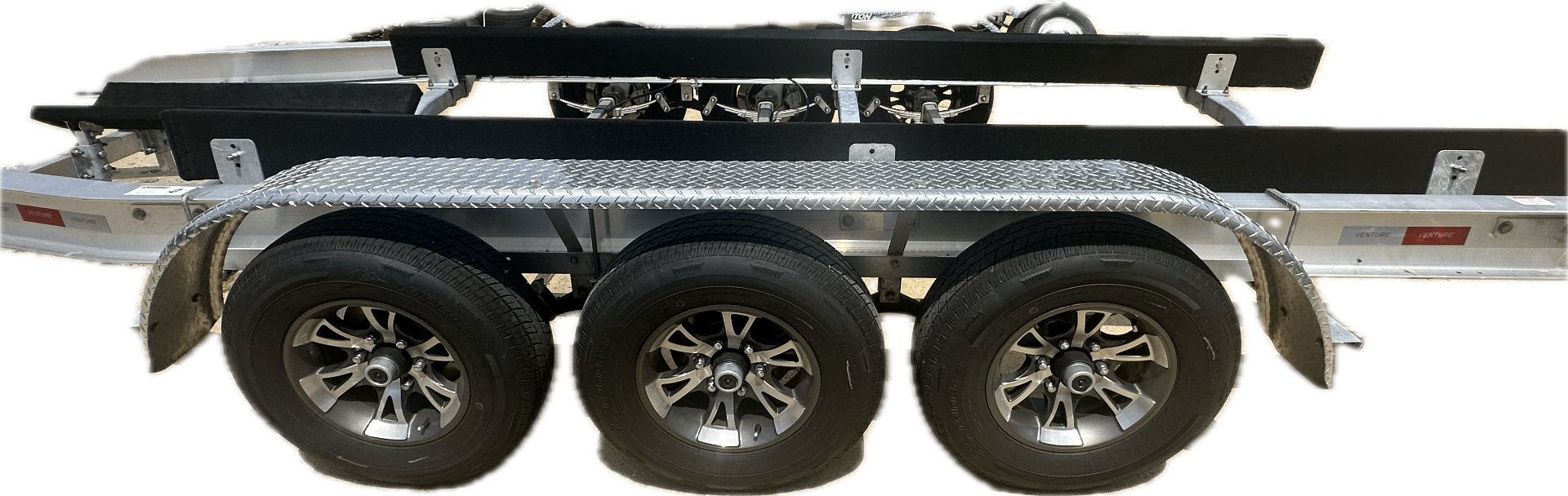 Triple-axle aluminum boat trailer with diamond plate fenders and alloy wheels